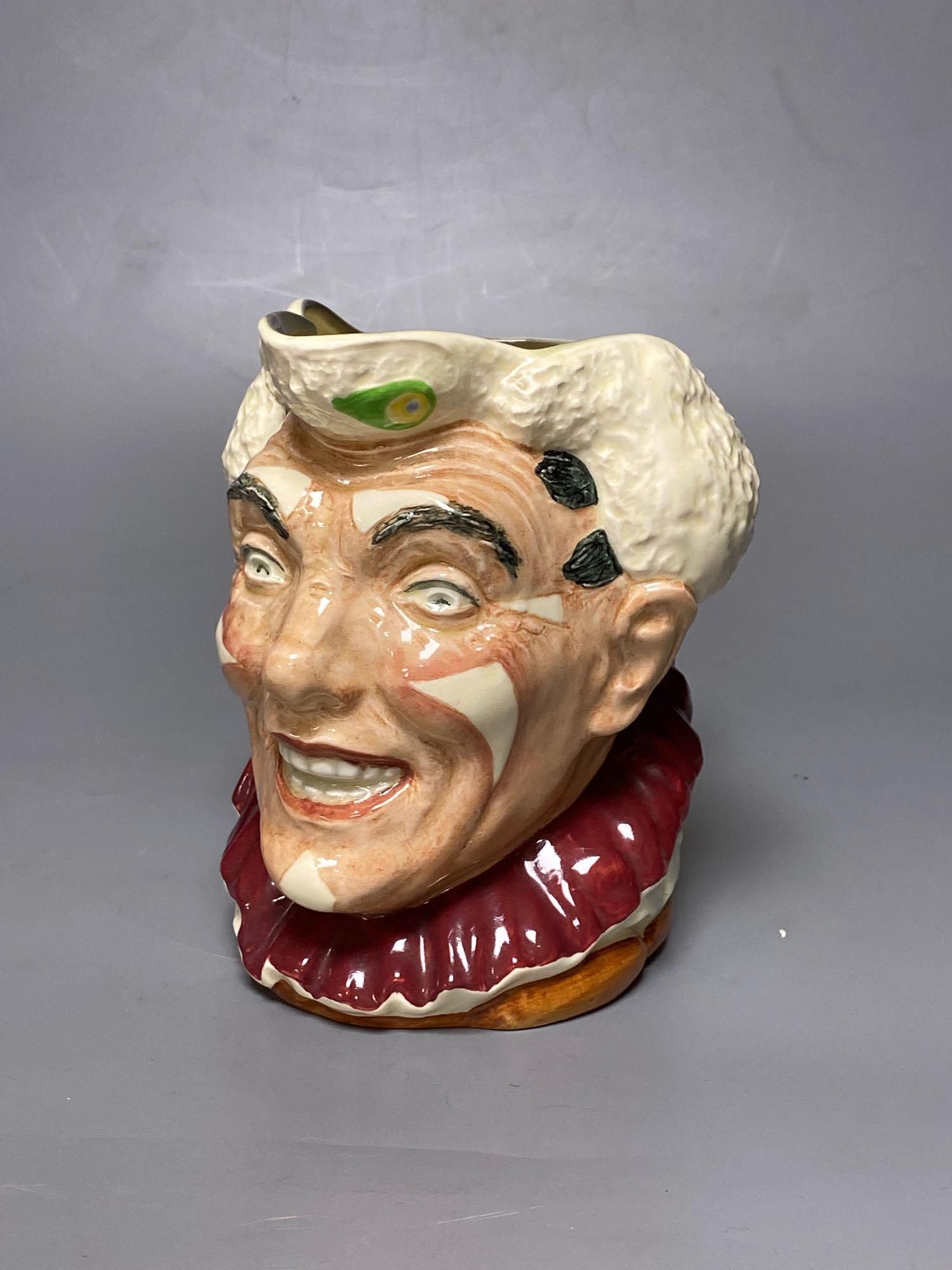 A Royal Doulton White haired Clown character jug